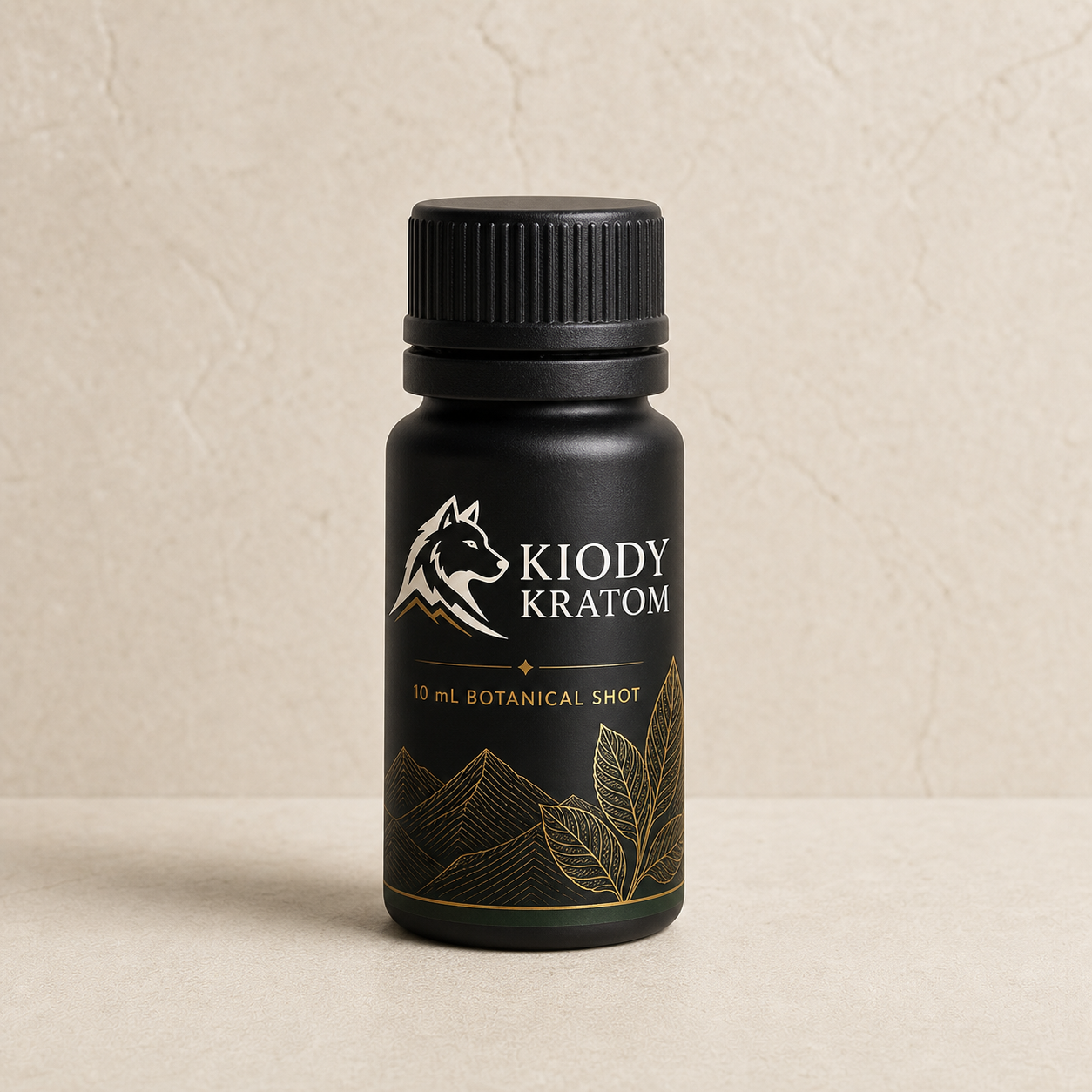 Kiody Kratom 10 milliliter botanical shot in a matte black bottle with gold kratom leaf and mountain artwork