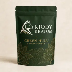 Kiody Green Hulu Kratom powder in a forest-green pouch with gold botanical artwork