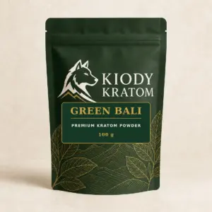 Kiody Premium Green Bali Kratom Powder 100 g bag with current wolf logo and antique-gold botanical inlay