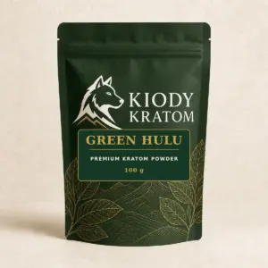 Kiody Premium Green Hulu Kratom Powder 100 g bag with current wolf logo and antique-gold botanical inlay