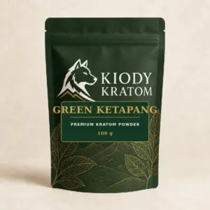 Kiody Premium Green Ketapang Kratom Powder 100 g bag with current wolf logo and antique-gold botanical inlay