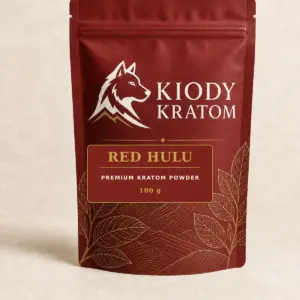 Kiody Premium Red Hulu Kratom Powder 100 g bag with current wolf logo and antique-gold botanical inlay