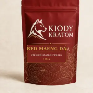 Kiody Premium Red Maeng Da Kratom Powder 100 g bag with current wolf logo and antique-gold botanical inlay