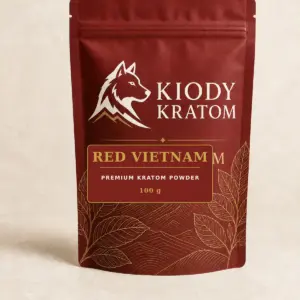 Kiody Premium Red Vietnam Kratom Powder 100 g bag with current wolf logo and antique-gold botanical inlay