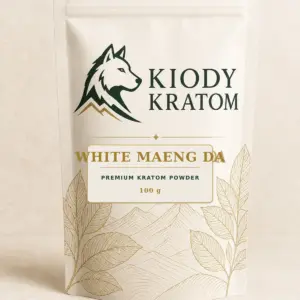 Kiody Premium White Maeng Da Kratom Powder 100 g bag with current wolf logo and antique-gold botanical inlay