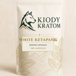 Kiody White Ketapang Kratom Capsules 100-count bag with current wolf logo and antique-gold botanical inlay