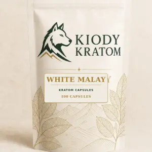 Kiody White Malay Kratom Capsules 100-count bag with current wolf logo and antique-gold botanical inlay